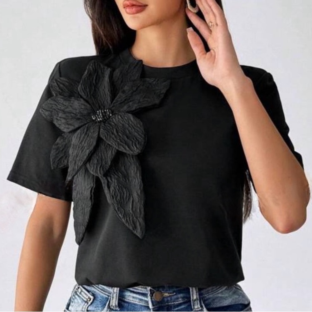 Black t-shirt with a flower
